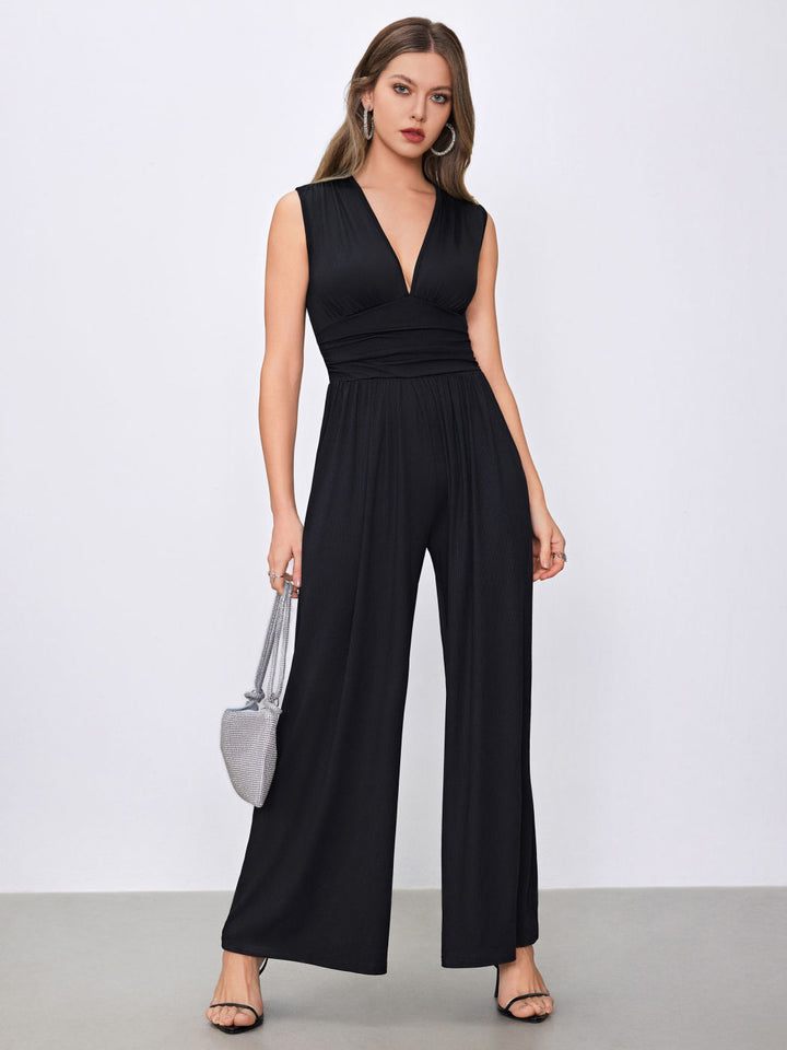 Irina - V-hals jumpsuit met ruches en wijde pijpen